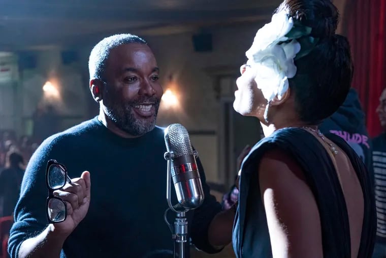 This image released by Hulu shows director Lee Daniels (left) with Andra Day on the set of "The United States vs. Billie Holiday."