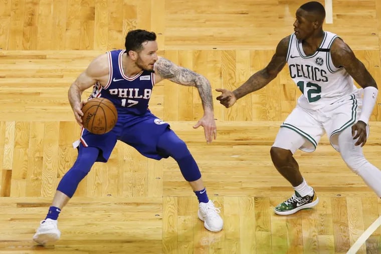 Sixers guard JJ Redick dribbles, guarded by Celtics’ guard Terry Rozier during the Sixers’ Game 5 loss on Wednesday.