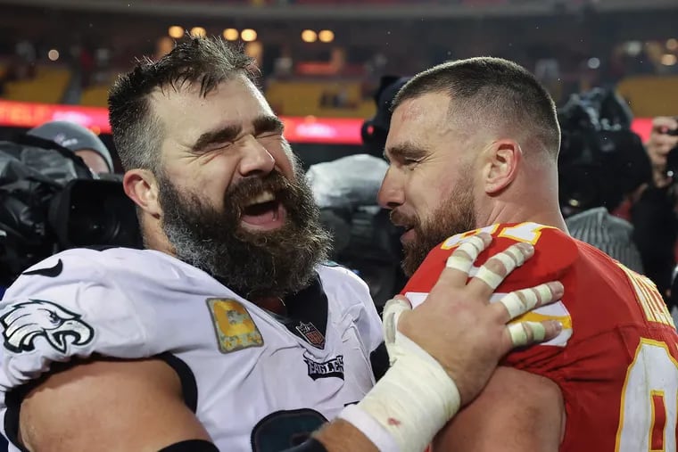 Philadelphia Eagles center Jason Kelce (left) shares a laugh with his brother, Kansas City Chiefs tight end Travis Kelce, after they faced off earlier this season.