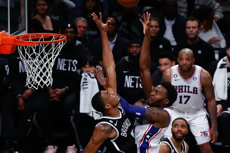 Sixers forward Paul Reed shoots the basketball over Brooklyn Nets center Nic Claxton during Game 4 of the first round Eastern Conference playoffs on Saturday, April 22, 2023 in New York.