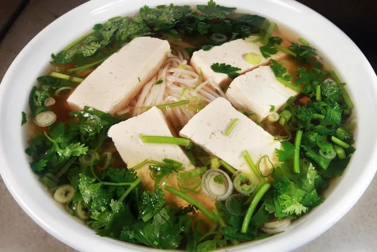 Mushroom pho at Stock, among the beef-free options, has rice noodles and exotic Vietnamese spice, and packs an umami punch. (DAVID M WARREN / Staff Photographer)
