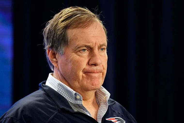 New England Patriots head coach Bill Belichick makes a statement regarding deflated footballs in the AFC Championship game during a press conference at Gillette Stadium. (Stew Milne/USA TODAY Sports)