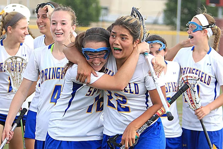 Springfield (Delco) celebrates after the game. (Charles Fox/Staff Photographer)