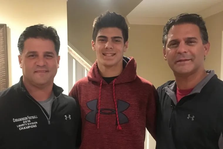 Cinnaminson coach Mario Patrizi (left) pictured with his nephew Nick and brother Mike. Mario Patrizi was named Coach of the Year by the Brooks-Irvine Memorial Football Club on Monday night.