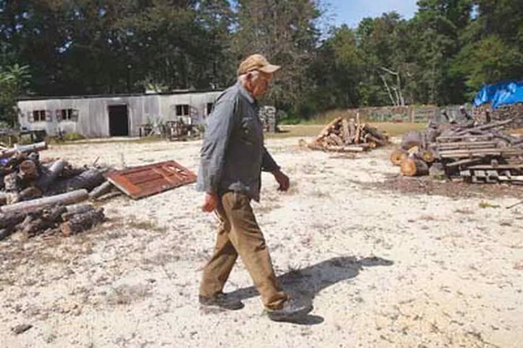 Bill Wasiowich, of Woodmansie, NJ, lives on his own in the Pine Barrens. Wasiowich walks back to his house on September 17, 2012. ( DAVID MAIALETTI  / staff photographer )