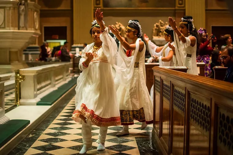 Dancers in the Cathedral Basilica of Ss. Peter and Paul celebrate the diversity of the Catholic diaspora during a special mass, incorporating prayers in eight languages, on Saturday, March 19, 2016. AARON WINDHORST / Staff Photographer