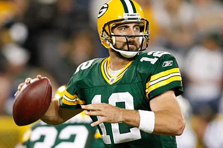 Aaron Rodgers and the Packers will play the Eagles at Lincoln Financial Field on Sunday. (AP Photo/Mike Roemer)