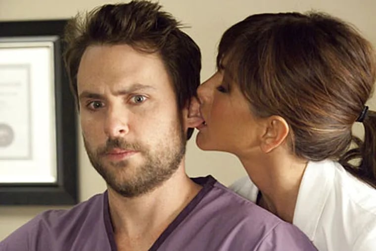 Charlie Day and Jennifer Aniston in "Horrible Bosses."
