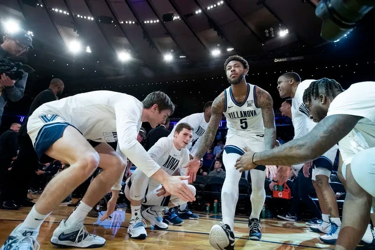 Justin Moore of Villanova is introduced as part of the starting lineup against Georgetown in the Big East Tournament game at Madison Square Garden on March 8, 2023.
