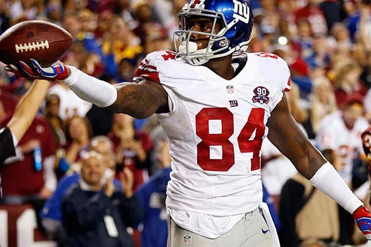 New York Giants tight end Larry Donnell (84) celebrates after scoring a touchdown against the Washington Redskins in the second quarter at FedEx Field. (Geoff Burke/USA Today)