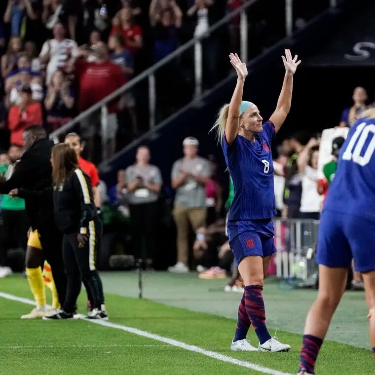 Julie Ertz waves to the crowd after being subbed out of her final soccer game late in the first half.