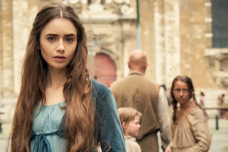 Lily Collins plays Fantine, a young woman who is abandoned by her lover and must make her way with her daughter, in the "Masterpiece" production of  Victor Hugo's "Les Miserables," premiering Sunday.
