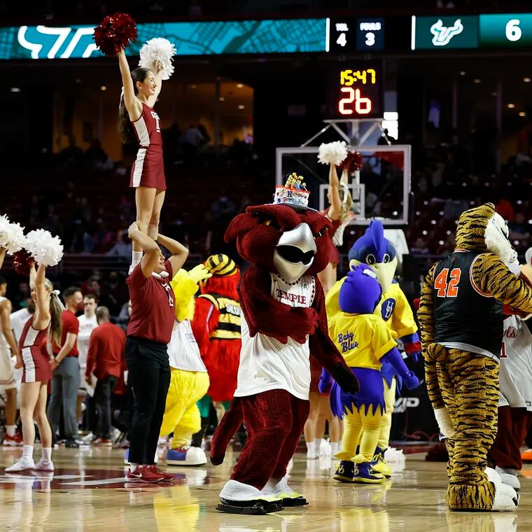 The Temple Owls mascot Hooter celebrates its birthday with other mascots from the area. Five different people play the role of Hooter.