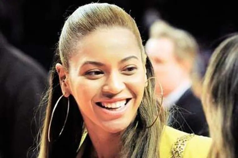Beyonce won a story for Essence magazine that won a prize. (AP Photo)