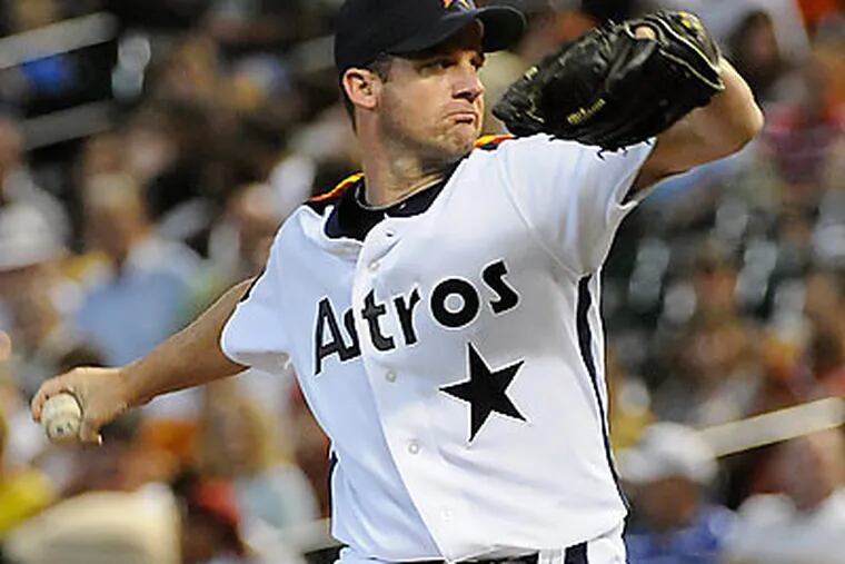 Houston Astros ace Roy Oswalt would reportedly prefer to be traded to St. Louis or Atlanta. (Pat Sullivan/AP)