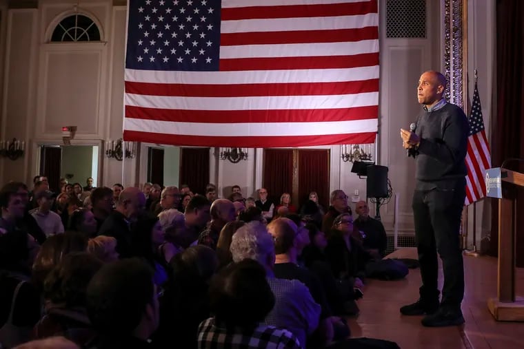 Sen. Cory Booker (D., N.J.) pauses while sharing a personal story while speaking at a post-midterm election victory celebration in Manchester, N.H., on Dec. 8. The visit further stoked speculation that Booker will soon launch a run for the Democratic presidential nomination.
