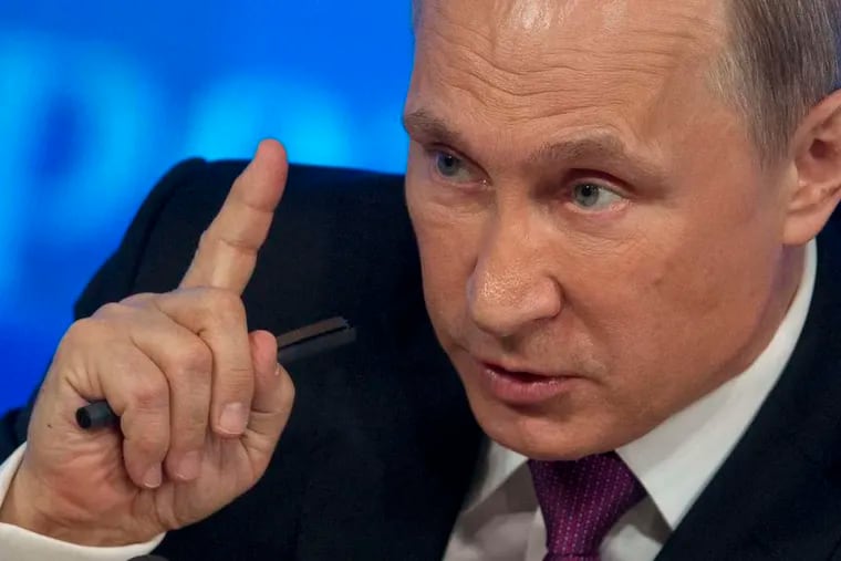 President Vladimir Putin, in his annual year-end news conference Thursday, blamed the West for much of Russia's troubles, but acknowledged that the economy is not diversified.