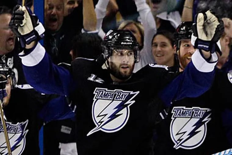 Lightning winger Simon Gagne celebrates his third period goal in Game 4 against the Bruins. (Chris O'Meara/AP Photo)