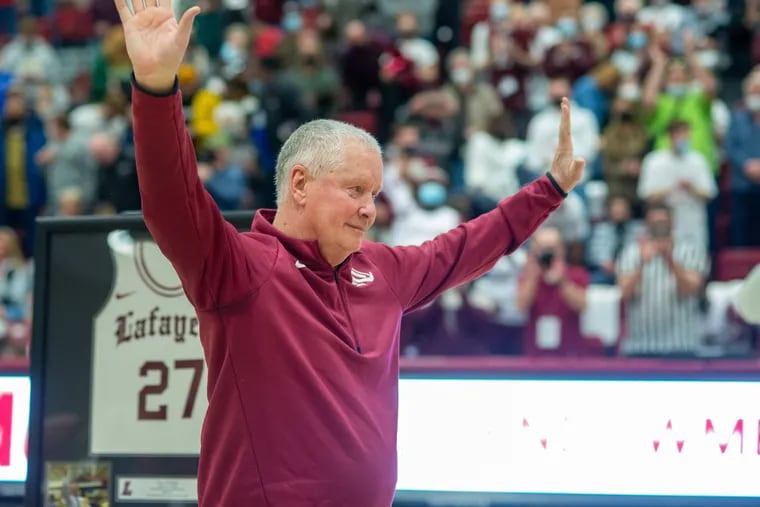 Lafayette College basketball coach Fran O'Hanlon acknowledges the crowd after he was presented with a jersey commemorating his 27 years as head coach on Feb. 26, 2022.