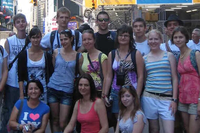 The Hungarian student group after arriving in New York last week. Dora Schwendtner (far left) and Szabolcs Prem (center, wearing sunglasses) died in Wednesday's Duck-boat tragedy.