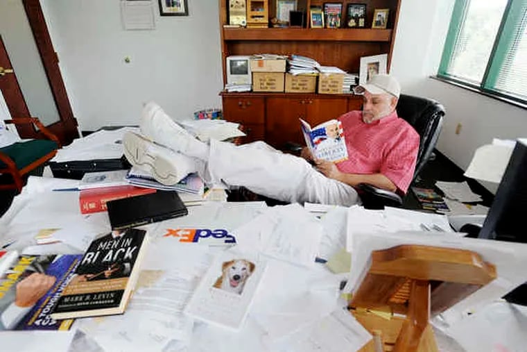 Mark Levin in his office in Leesburg, Va. Levin, who grew up in Erdenheim and Elkins Park, is now a radio talk-show host, lawyer, and president of the Landmark Legal Foundation.