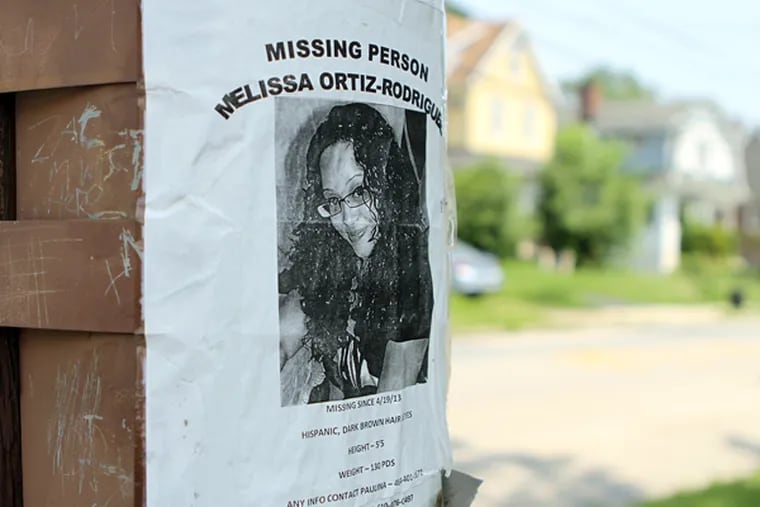 A missing-person poster at the site where police searched for the body of Melissa Ortiz-Rodriguez, in Collingdale in June 2013. She remains missing. (Stephanie Aaronson/Staff Photographer)