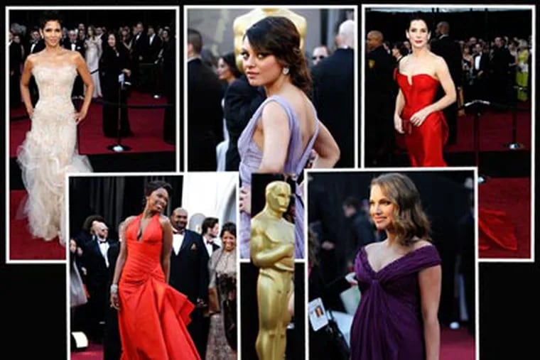 From left, Halle Berry, Jennifer Hudson, Mila Kunis, Natalie Portman and Sandra Bullock on the red carpet. (AP Photos)