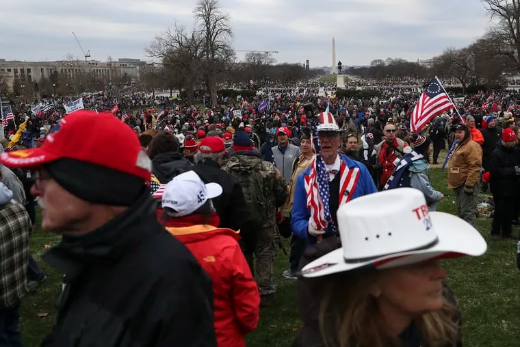 Trump supporters gather on the grounds to the U.S. Capitol building after a mob breached the building on Wednesday, Jan. 06, 2021. Rioters breached the building following a rally, as Congress was preparing to certify President Elect Joe Biden’s victory.