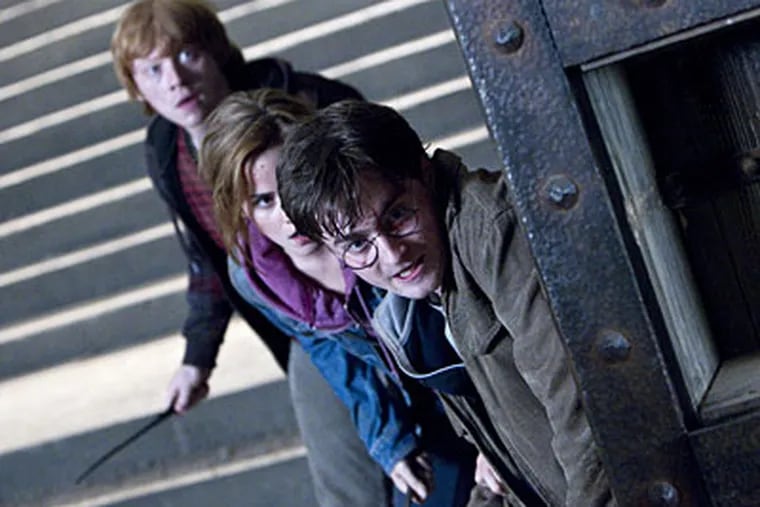 From left: Rupert Grint as Ron Weasley, Emma Watson as Hermione Granger and Daniel Radcliffe as Harry Potter in "Harry Potter and the Deathly Hallows - Part 2."