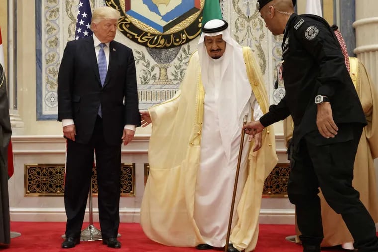 President Trump stands with Saudi King Salman at the Gulf Cooperation Council meeting in Riyadh on Sunday.