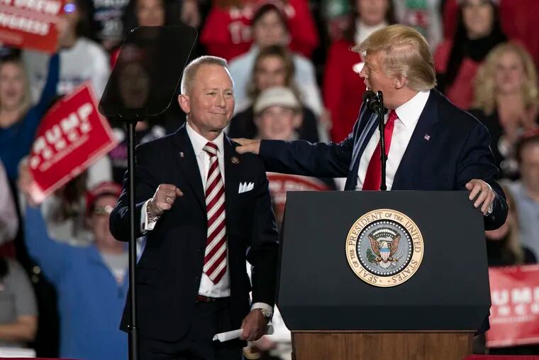New Jersey Rep. Jeff Van Drew with President Donald Trump at a Trump campaign rally in Wildwood last month.