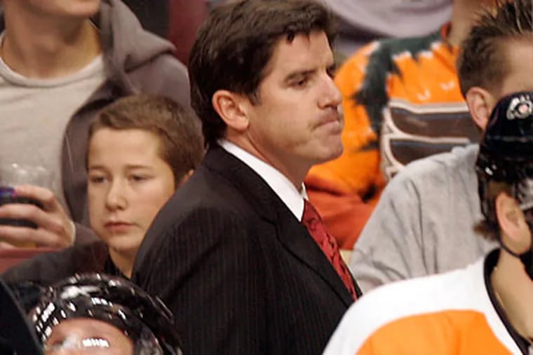 &quot;We got embarrassed,&quot; coach Peter Laviolette said of the Flyers' 4-1 loss to New Jersey on Saturday. (David Swanson/Staff file photo)