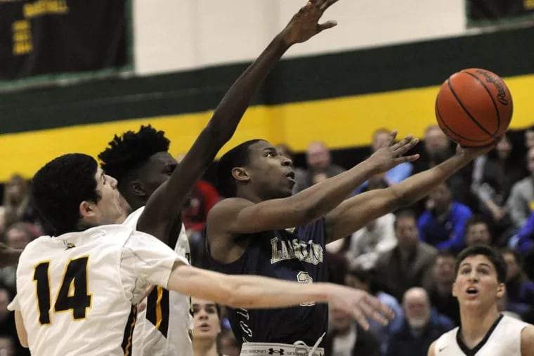 La Salle’s Jarrod Stukes (right) during a game against Archbishop Wood in January 2016.