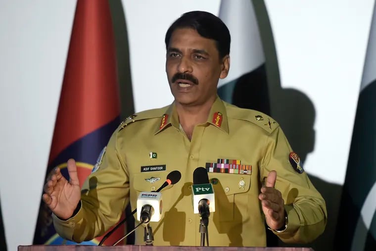 FILE - In this April 17, 2017, file photo, Pakistan's army spokesman Maj. Gen. Asif Ghafoor addresses a news conference in Rawalpindi, Pakistan. Ghafoor told a briefing of foreign journalists Tuesday, Dec. 4, 2018, that Pakistan's influence over the Taliban is overstated, yet he said Pakistan has repeatedly told the insurgent group to join the peace process. (AP Photo/Anjum Naveed, File)