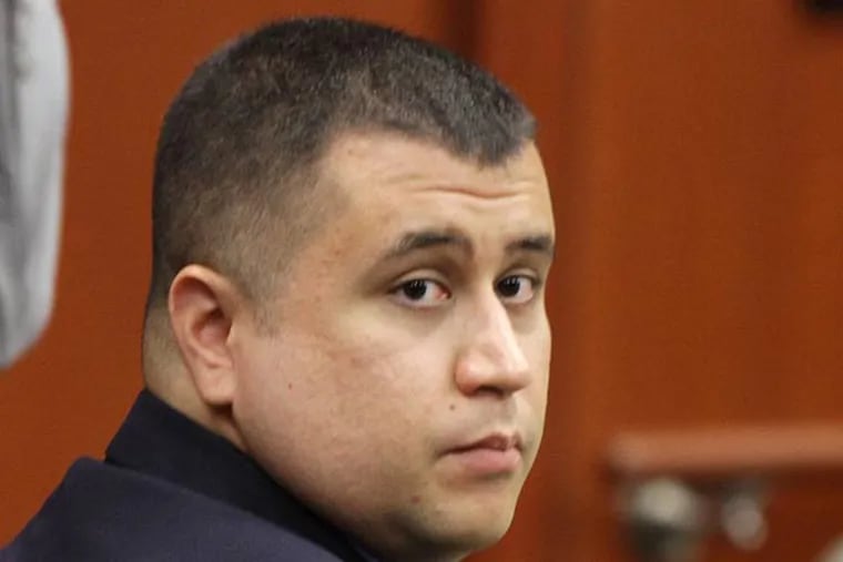 George Zimmerman watches during his hearing at the Seminole County Courthouse, on Oct. 19, 2012 in Sanford, Fla. A judge ruled that attorneys for  Zimmerman can inspect the school records and social media postings of Trayvon Martin he is accused of murdering on Feb. 26, 2012. (AP File Photo/Orlando Sentinel, Stephen M. Dowell, Pool)