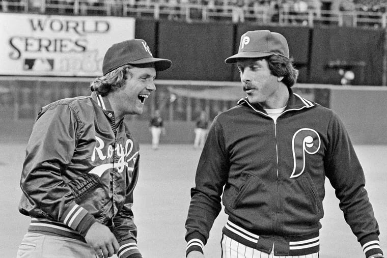 Mike Schmidt and the 1980 Phillies were 33-27 after 60 games but closed strong and won the franchise's first title over fellow Hall of Famer George Brett (left) and the Royals.