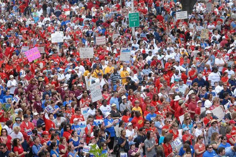 A crowd that state police estimated at 35,000 rallies outside the Statehouse in Trenton to protest Gov. Christie's veto Thursday of the so-called millionaire's tax and the cuts that his budget proposes.