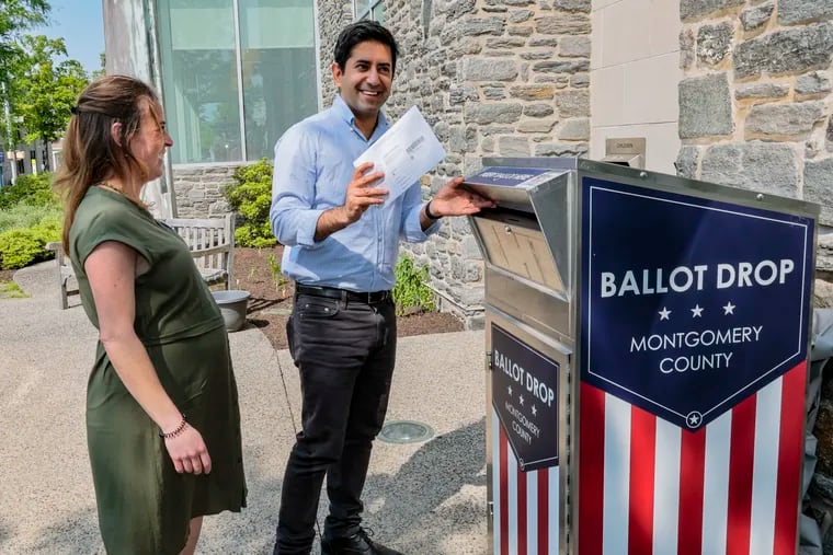 Montgomery County Commissioner Neil Makhija, at the time a candidate, voted with his wife Rachel Nash at the Ludington Library in Bryn Mawr last year. Makhija has proposals for expanding voter access in the county.