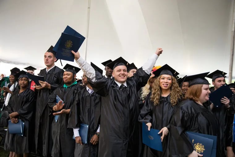 Camden County College students celebrate commencement in May 2018.