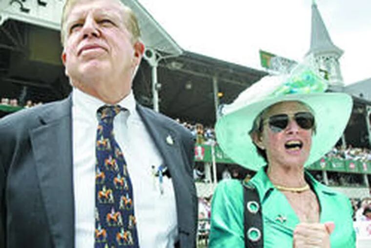 Gretchen and Roy Jackson take in the sixth race on this year&#0039;s Derby day at Churchill Downs, where their horse had triumphed so spectacularly a year earlier, winning by 61/2 lengths. The Jacksons enjoyed their return to the track.