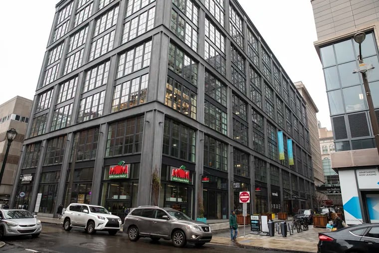 Drugmaker Merck is establishing an office at the WeWork coworking space in 1100 Ludlow St. building, which also houses MOM's Organic Market.