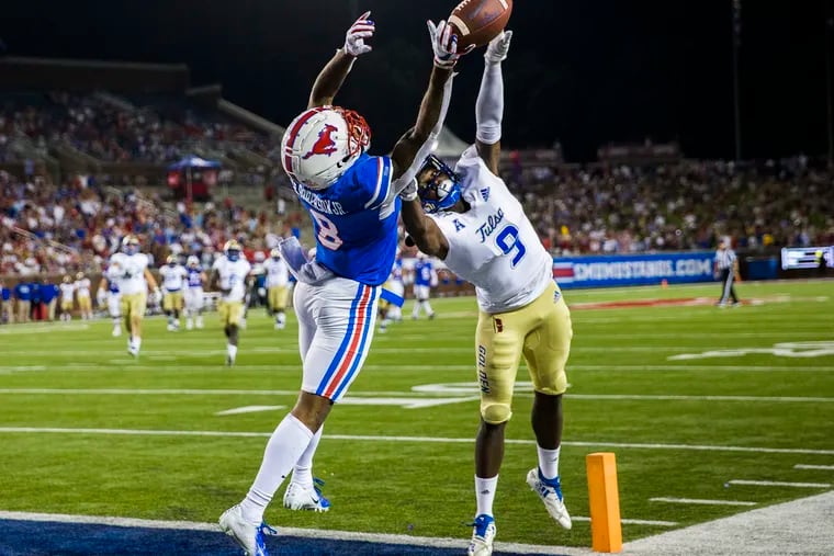 Tulsa cornerback Reggie Robinson, shown defending a pass against SMU last season, could be a third- or fourth-round possibility for the Eagles in the draft.