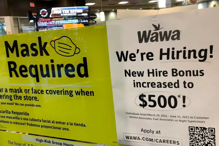 Sign in a Wawa in Pennsauken offering $500 bonuses as restaurants and retailers cope with a labor shortage.