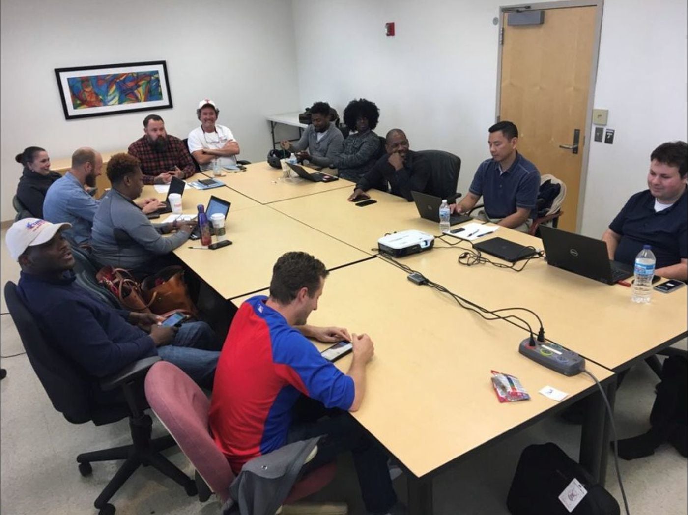 A biweekly coordination meeting of the Communities Partnering for Peace — a coalition of nine violence prevention outreach nonprofit organizations from nine neighborhoods in Chicago.