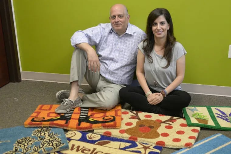 Alex and Eirini Kalfatides opened a door mat business, Entry Ways, located in Heritage Square Shopping Center in Cherry Hill, New Jersey. (BEN MIKESELL / Staff Photographer)