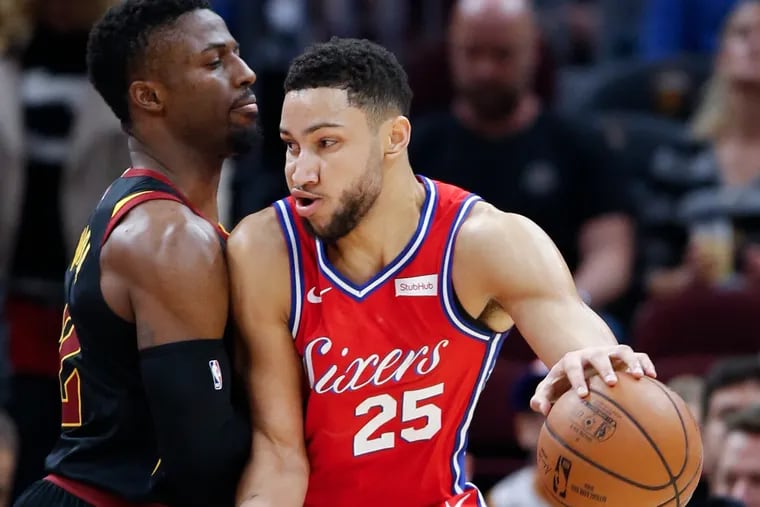 Ben Simmons tries to drive past the Cavaliers' David Nwaba during the Sixers' win on Sunday.