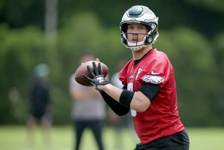 Nick Foles looks to throw the ball during Eagles OTAs on Tuesday.