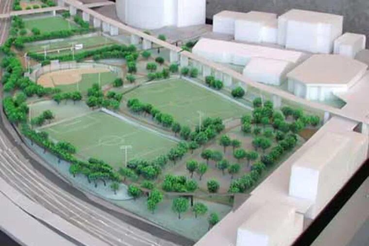 An artist’s vision of Penn Park, Penn's plan to rejuvenate parking lots it acquired from the Postal Service into open space and sports fields.