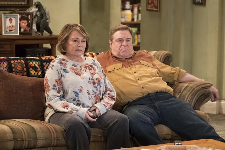 Roseanne Barr, left, and John Goodman in a scene from ABC’s reboot of “Roseanne.”