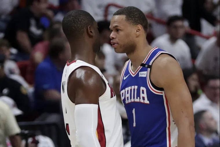 The Miami Heat’s Dwyane Wade (left) and the Sixers’ Justin Anderson went face-to-face in Game 3 of their NBA playoffs Eastern Conference quarterfinal series.